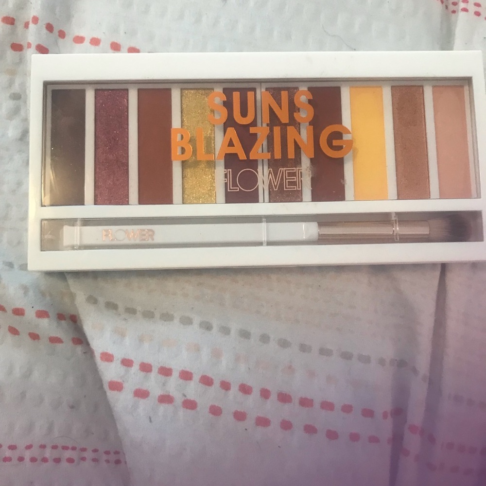 Eyeshadow palette by flower. Suns blazing